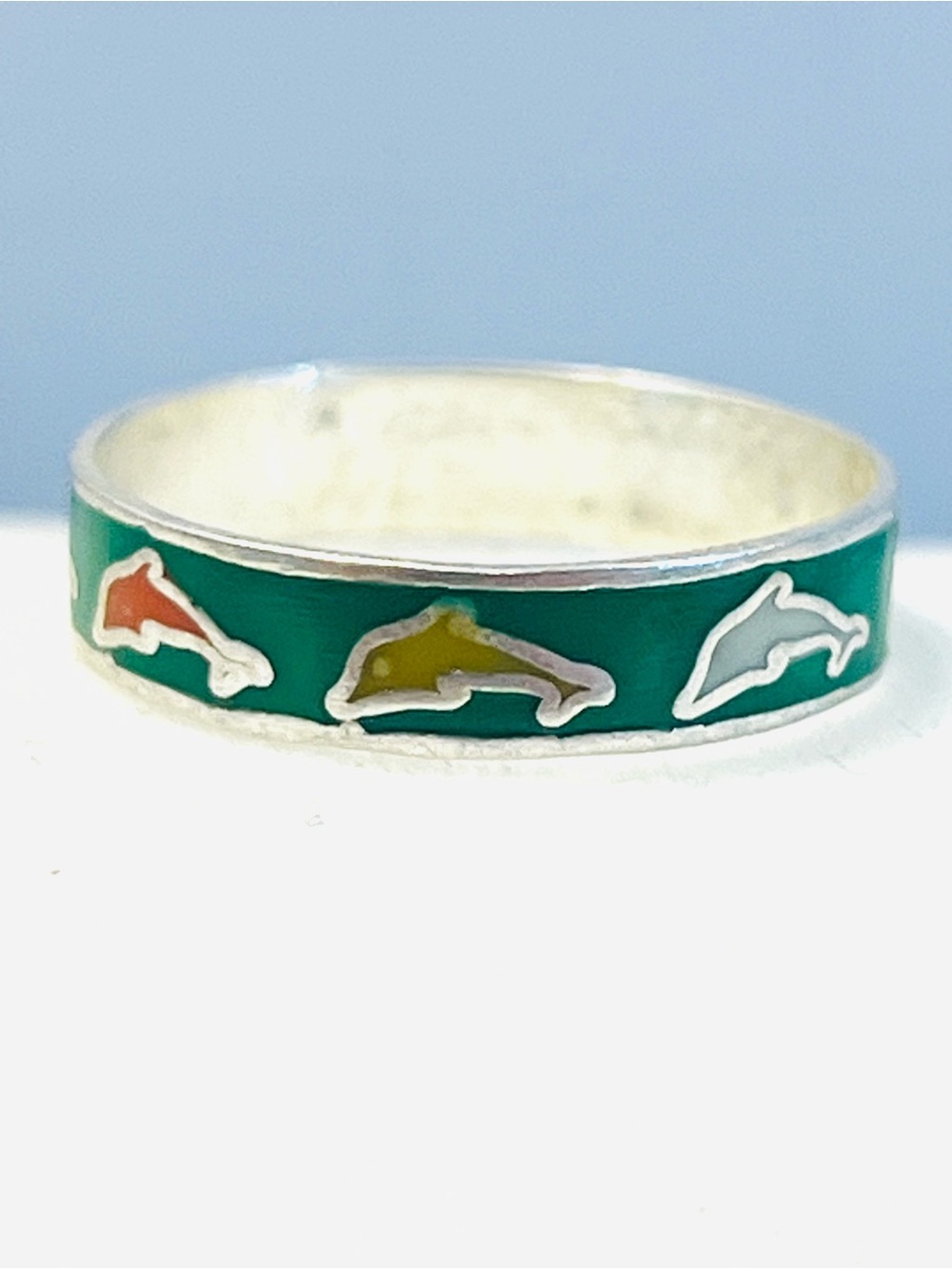 sterling silver band ring pattern of colorful enamel-filled dolphins
